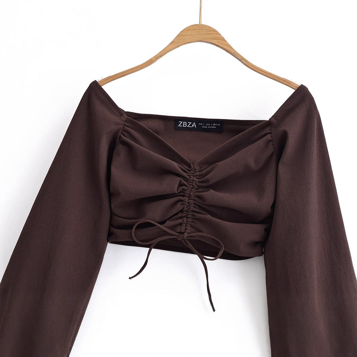 V-neck long sleeved pleated elastic solid color top for women
