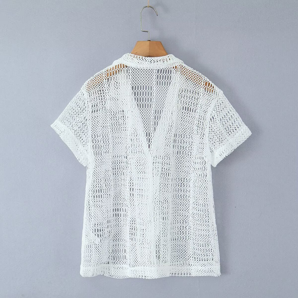 Flip V-neck short sleeved single breasted see through top for women