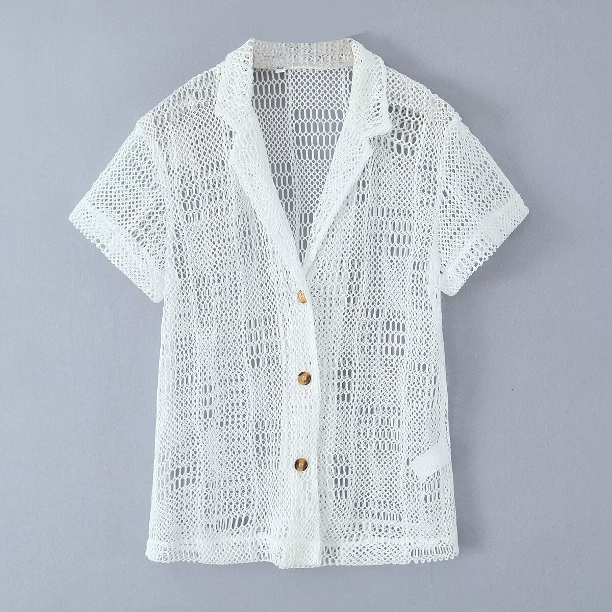 Flip V-neck short sleeved single breasted see through top for women