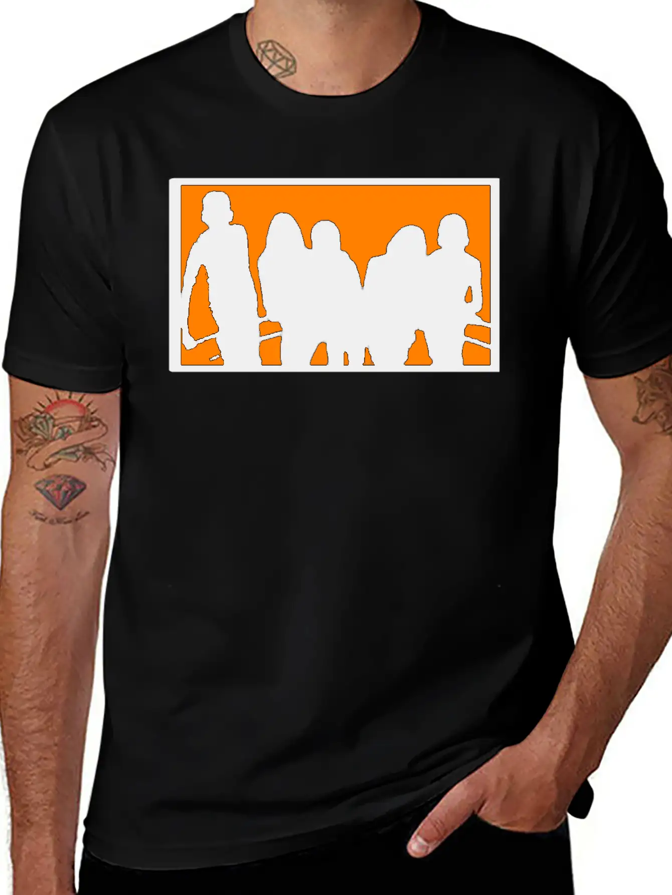Silhouette Of A Group Against Orange Background Stylish Everyday T-Shirt – Unisex Basic Cotton Tee