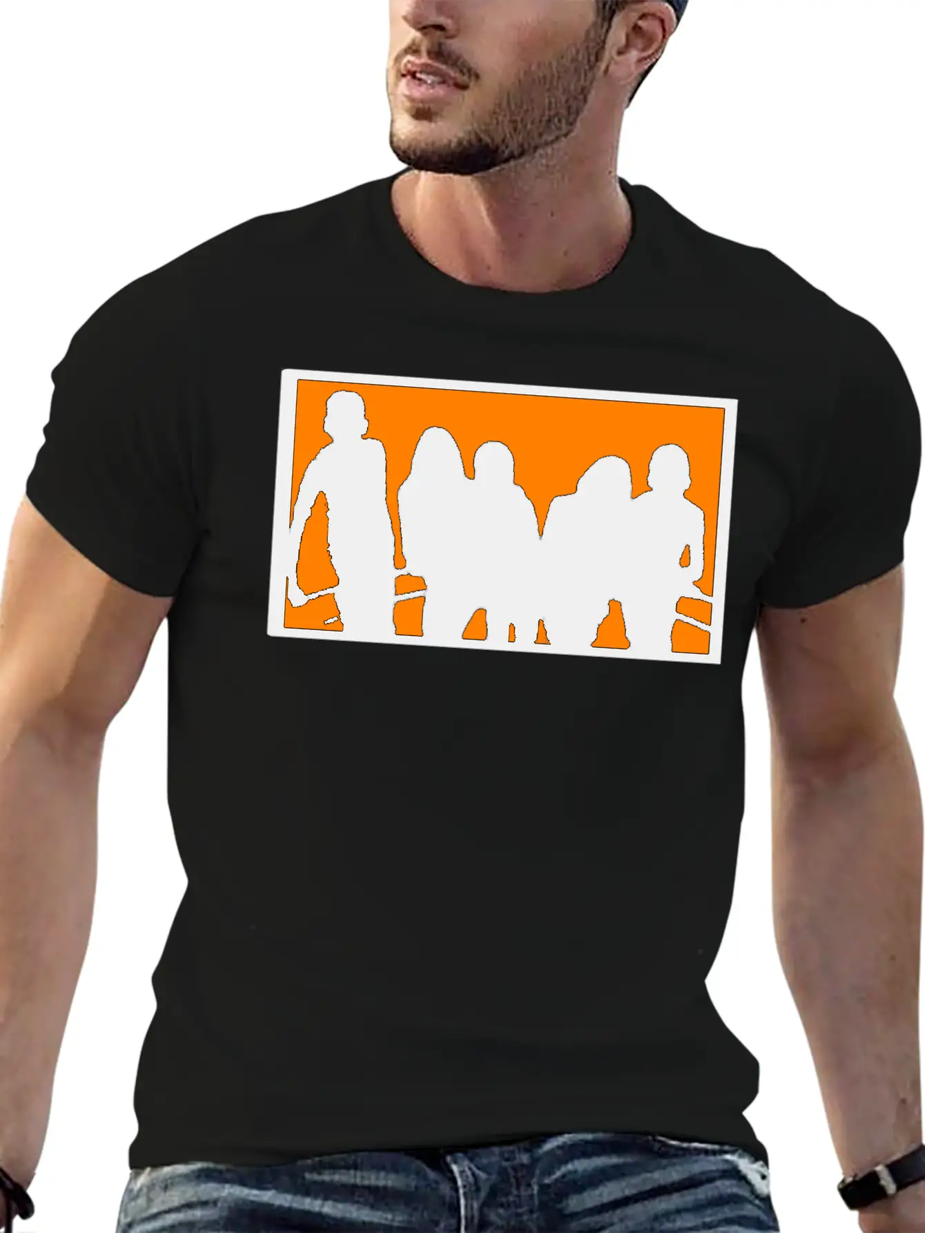 Silhouette Of A Group Against Orange Background Stylish Everyday T-Shirt – Unisex Basic Cotton Tee